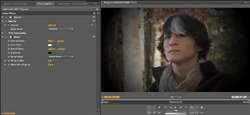 Video editing software interface with a color grading panel and a video frame of a young man.